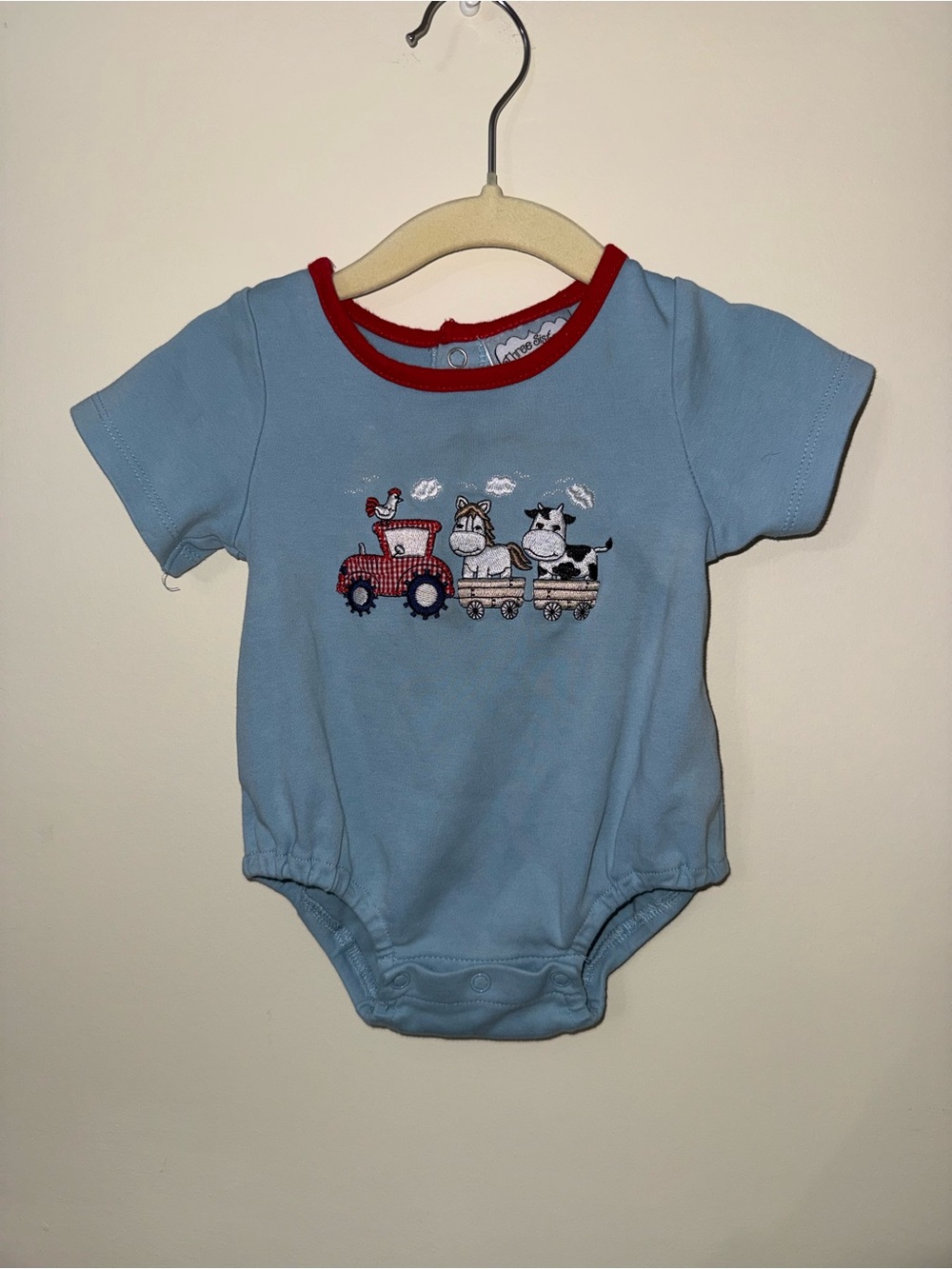 Light Blue Baby One-Piece with Red Trim and Farm Train Motif